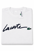Polera Lacoste blanca con letras cursivas y cocodrilo verde