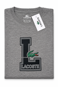 Polera Lacoste con letra L y cocodrilo verde